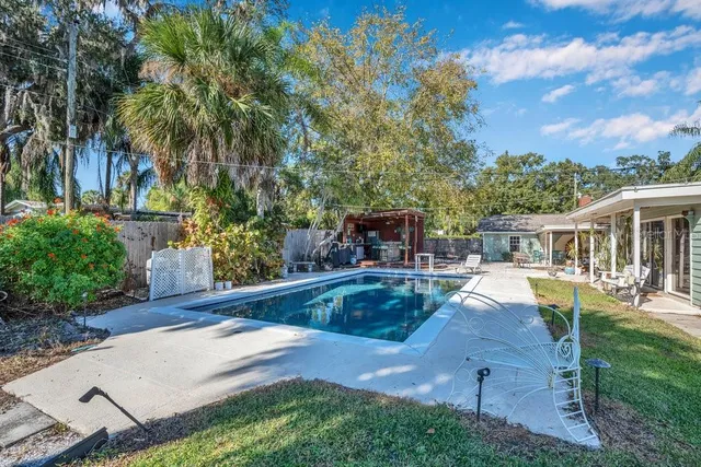a kitchen that has a sink and a stove