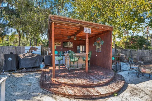 an aerial view of a houses with outdoor space