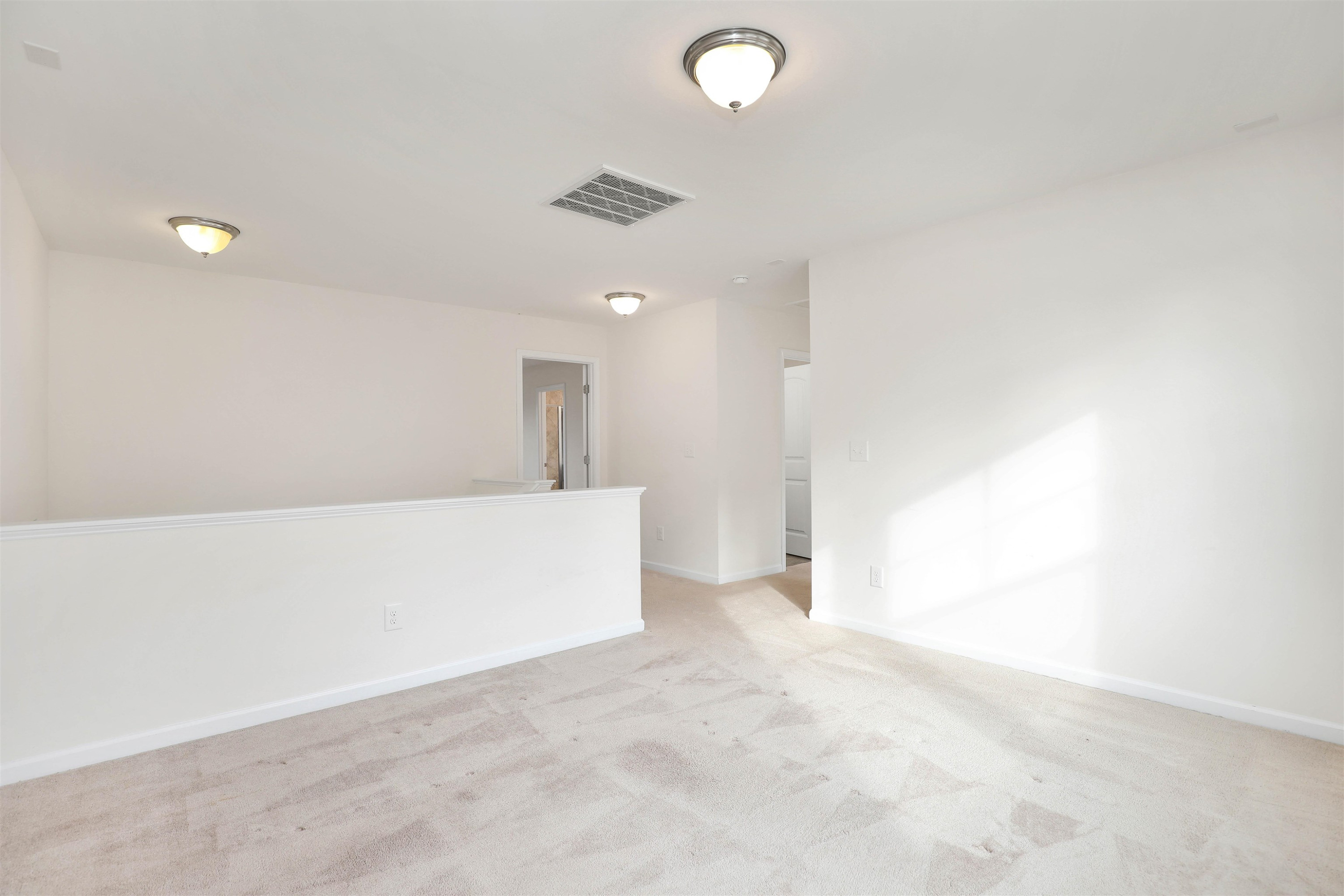 3413 Flat River Drive Durham, NC 27703 - Photo 19 of 40 a view of an empty room