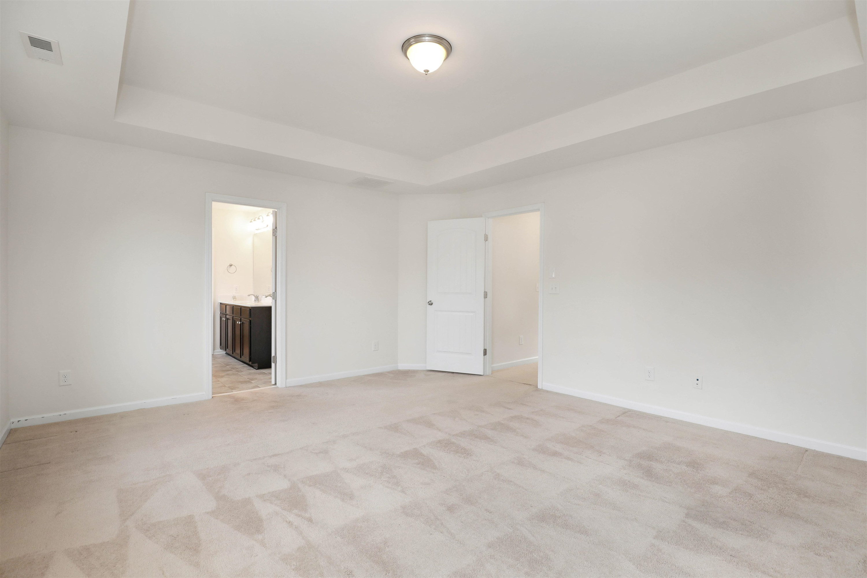 3413 Flat River Drive Durham, NC 27703 - Photo 23 of 40 a view of an empty room with a window