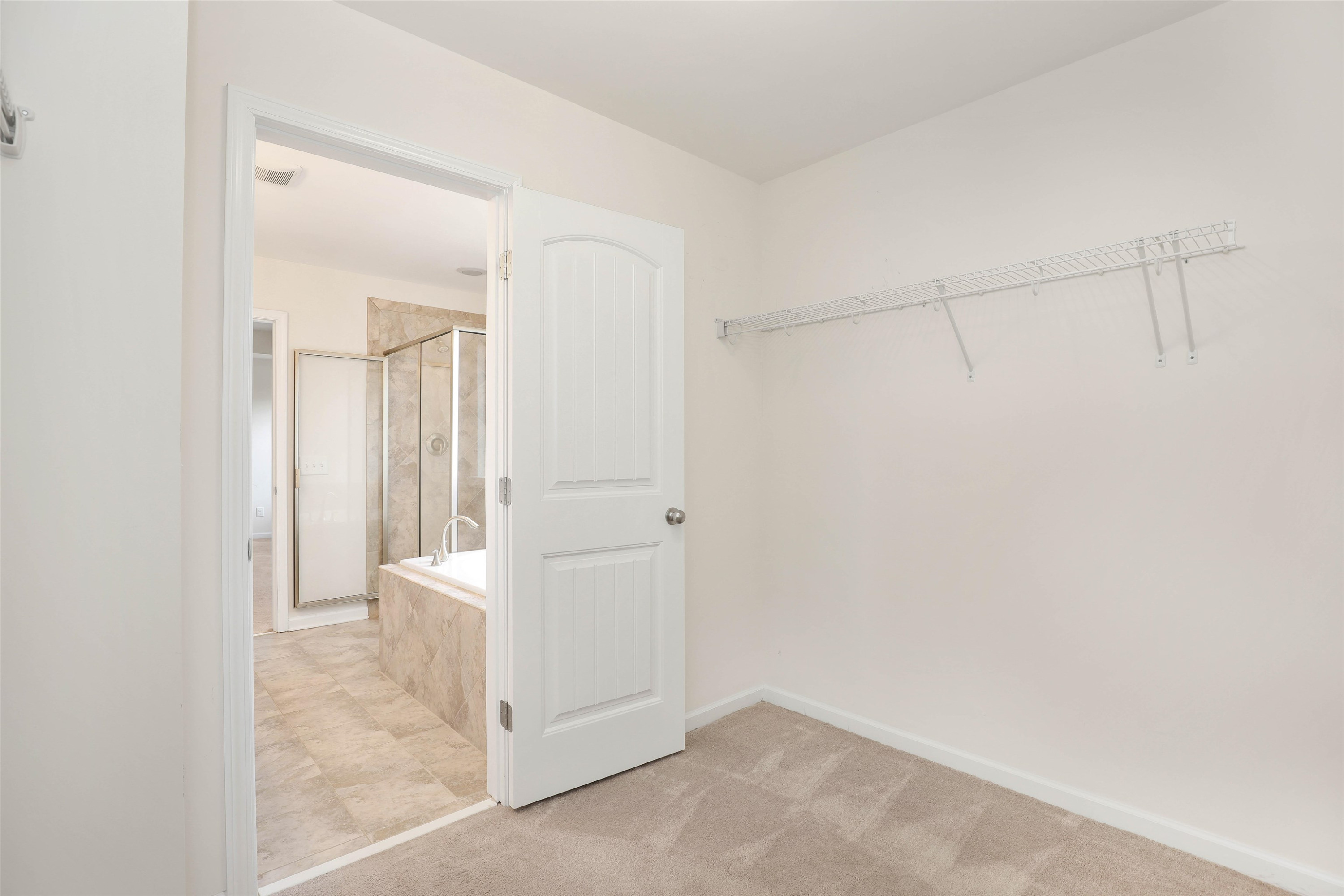 3413 Flat River Drive Durham, NC 27703 - Photo 28 of 40 a view of a room with an empty space