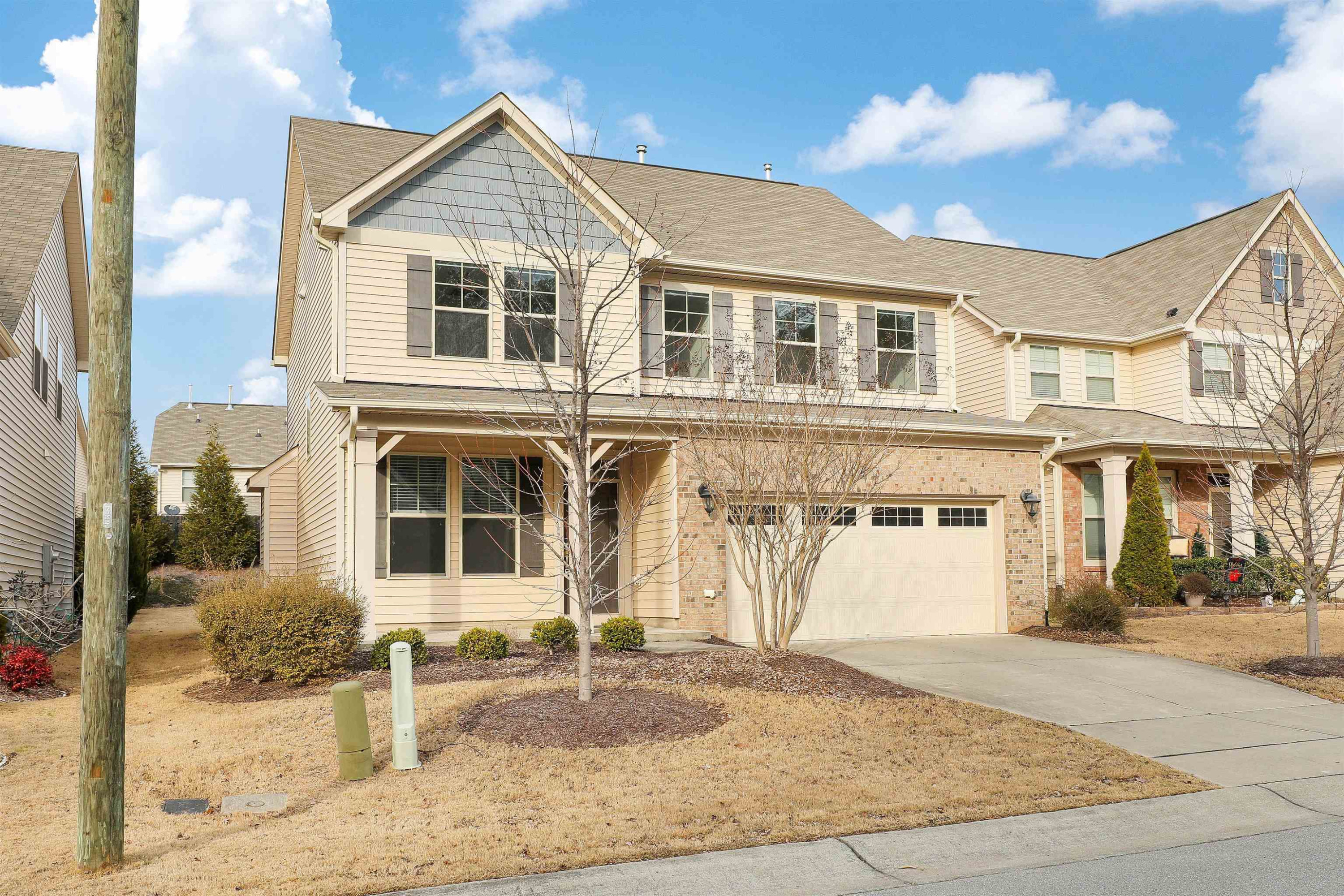 3413 Flat River Drive Durham, NC 27703 - Photo 3 of 40 a front view of a house with garden