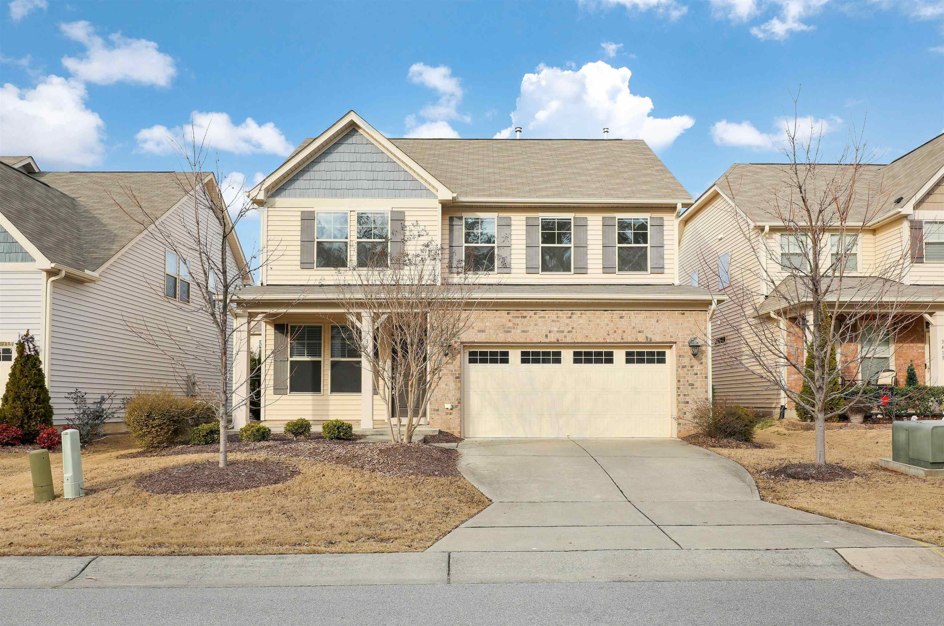 3413 Flat River Drive Durham, NC 27703 - Photo 4 of 40 a front view of a house with a yard