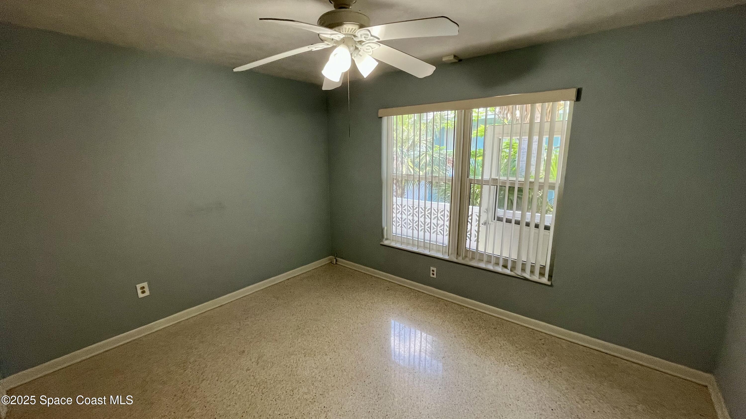 7181 Blue Shore Road Grant, FL 32949 - Photo 18 of 40 a view of an empty room with a window
