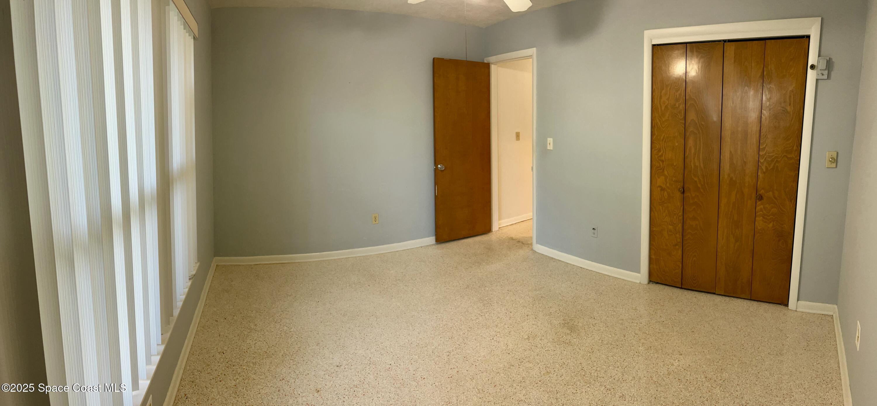 7181 Blue Shore Road Grant, FL 32949 - Photo 19 of 40 a view of an empty room and window