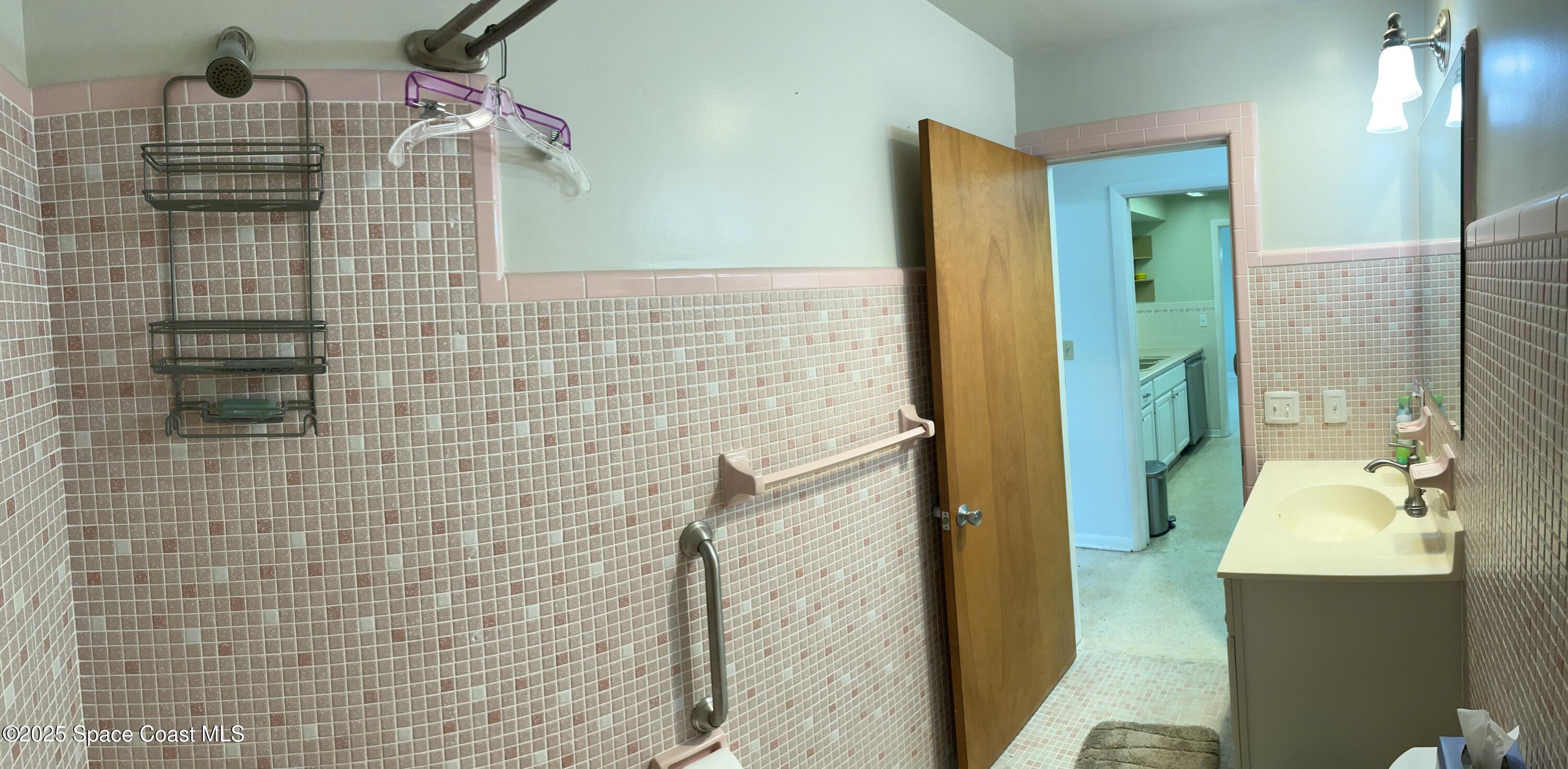 7181 Blue Shore Road Grant, FL 32949 - Photo 22 of 40 a bathroom with a shower