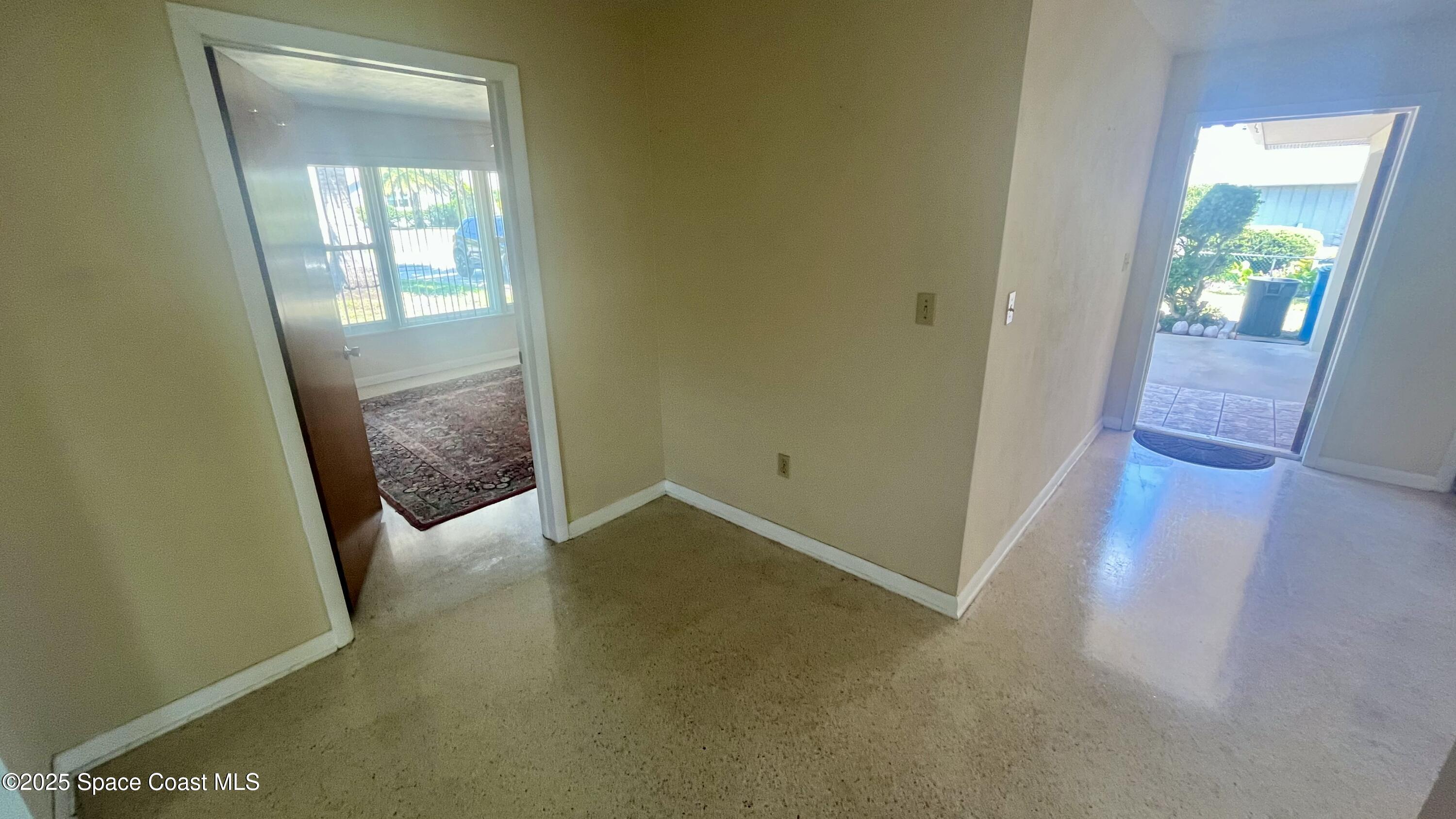7181 Blue Shore Road Grant, FL 32949 - Photo 7 of 40 an empty room with windows