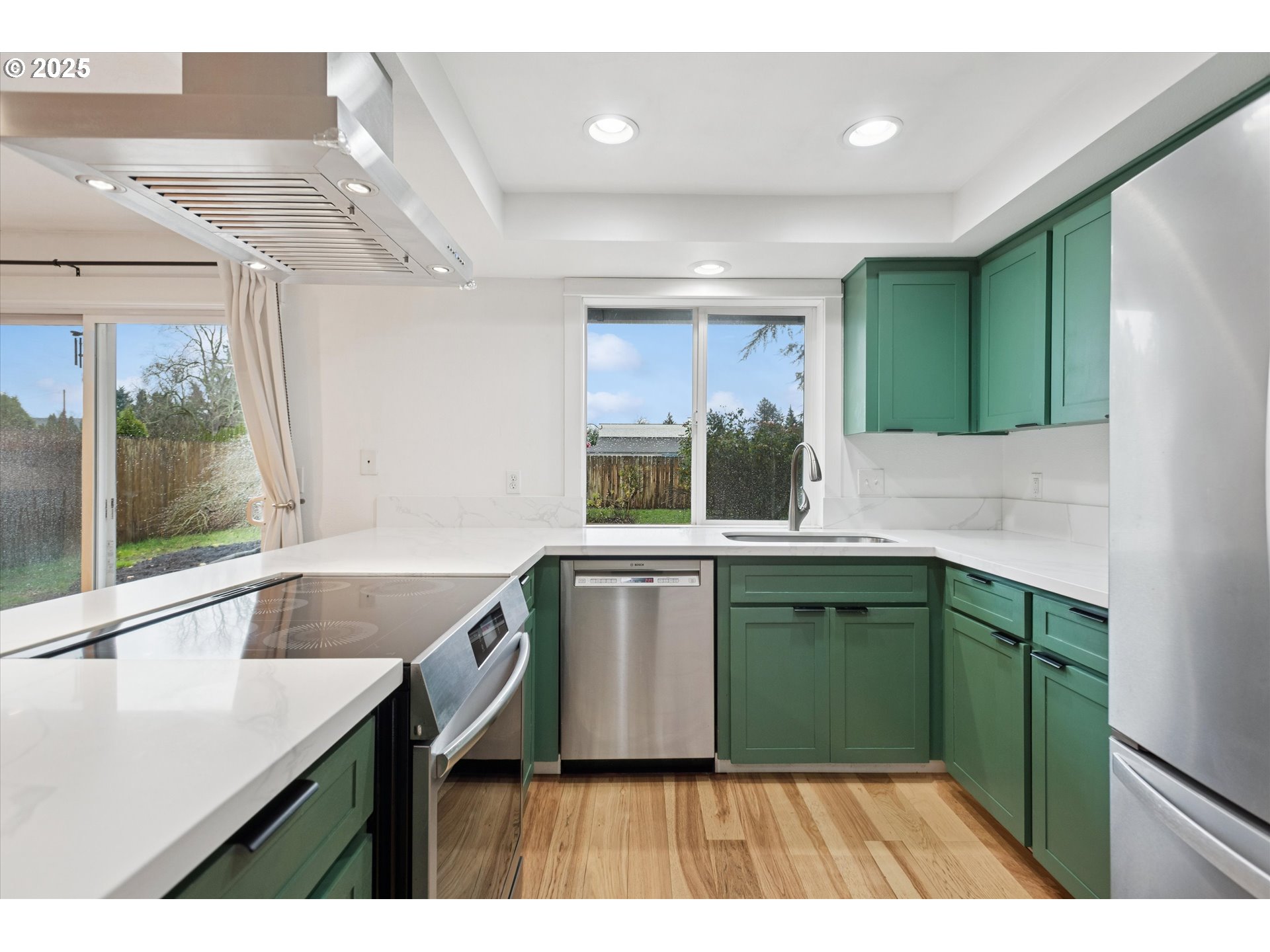 18800 Southwest Sandra Lane Beaverton, OR 97003 - Photo 14 of 41 a kitchen with a sink window and cabinets