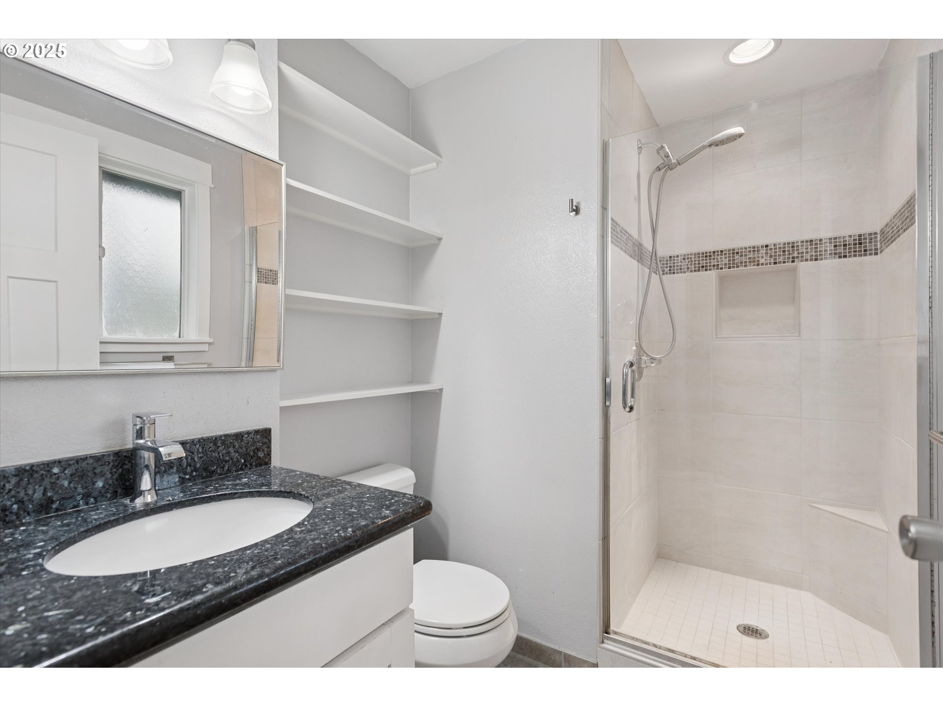 18800 Southwest Sandra Lane Beaverton, OR 97003 - Photo 26 of 41 a bathroom with a granite countertop sink toilet and shower
