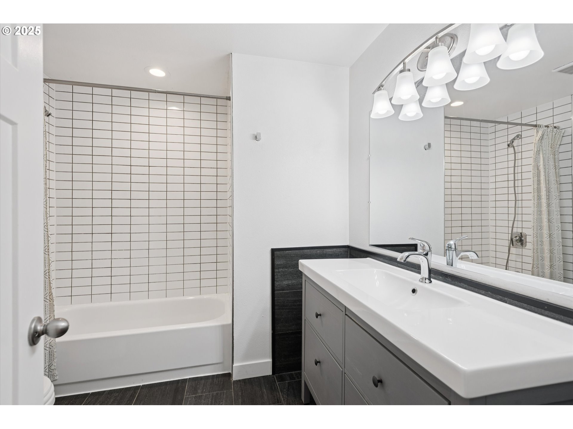 18800 Southwest Sandra Lane Beaverton, OR 97003 - Photo 32 of 41 a bathroom with a sink a bathtub and a shower