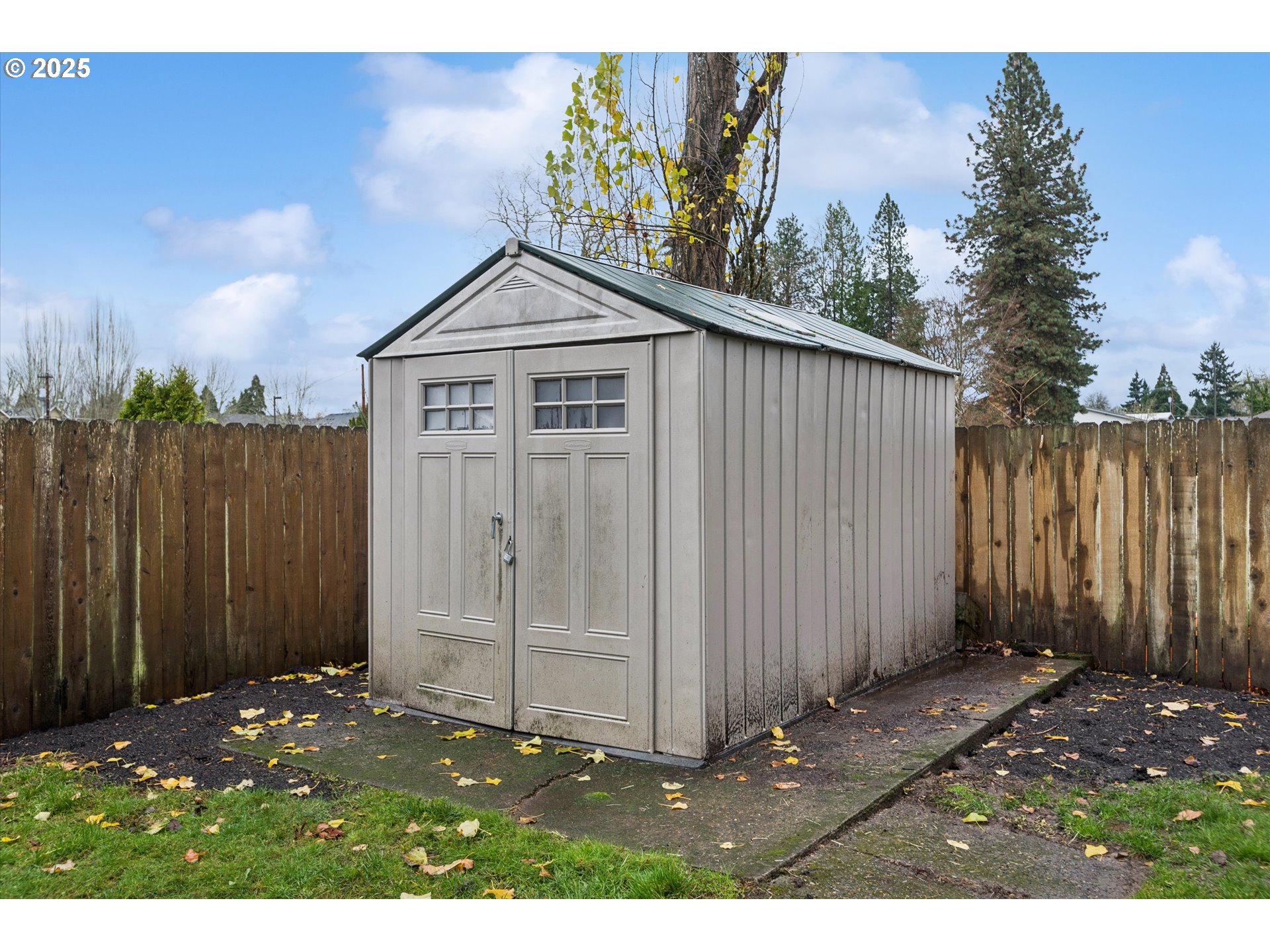 18800 Southwest Sandra Lane Beaverton, OR 97003 - Photo 39 of 41 a view of backyard of house with wooden fence