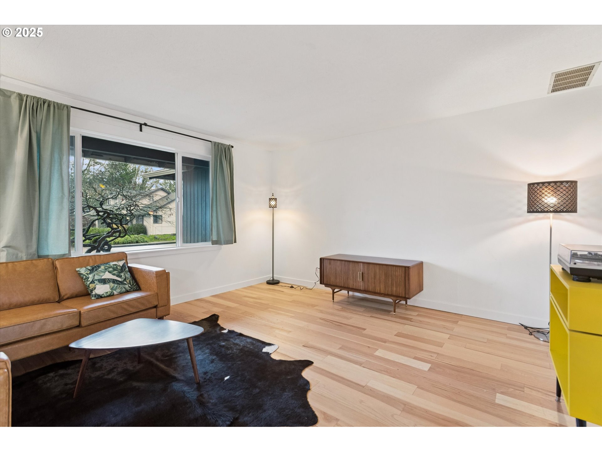 18800 Southwest Sandra Lane Beaverton, OR 97003 - Photo 5 of 41 a bedroom with a bed and a couch