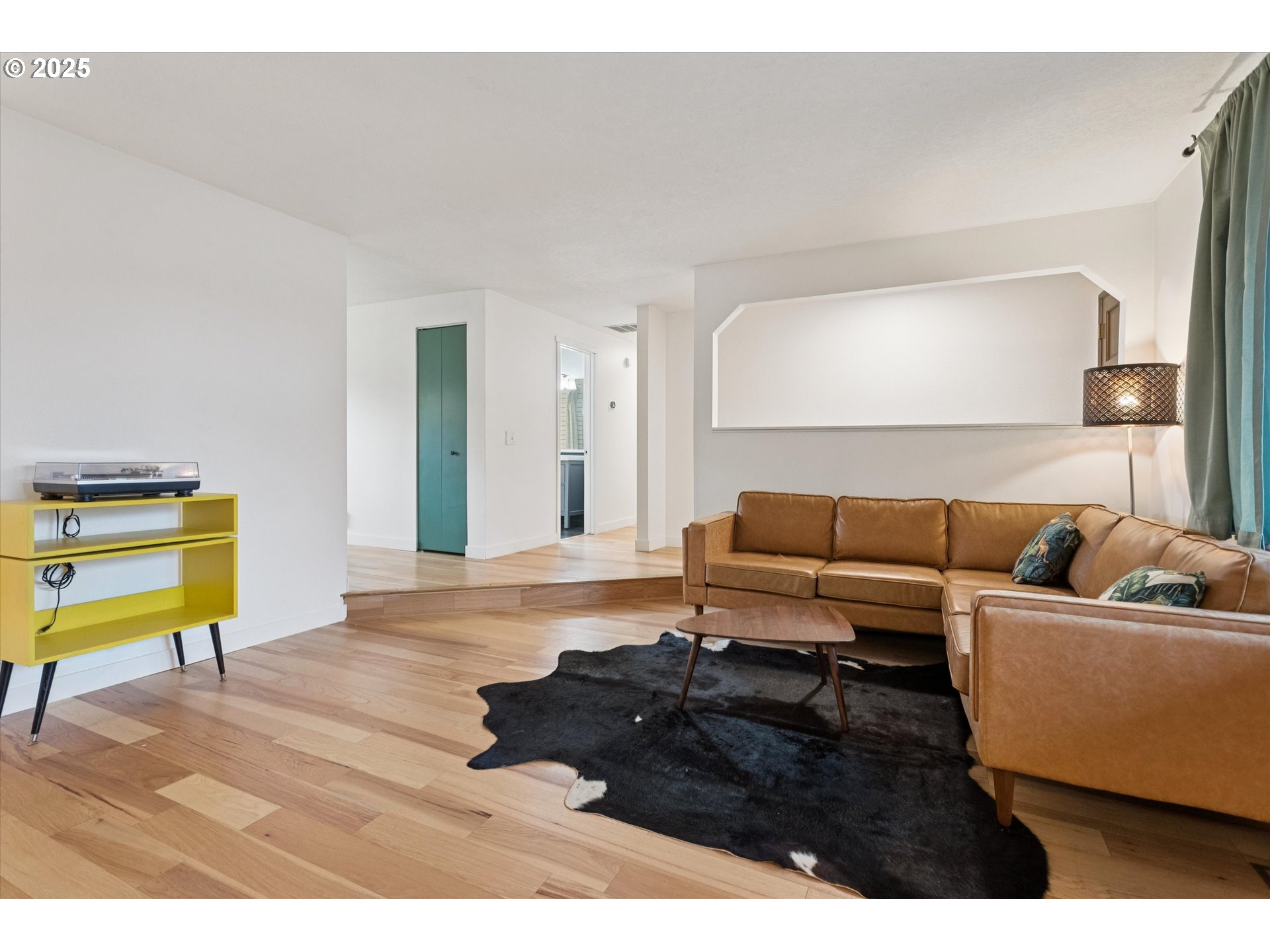 18800 Southwest Sandra Lane Beaverton, OR 97003 - Photo 7 of 41 a living room with furniture and a lamp with wooden floor
