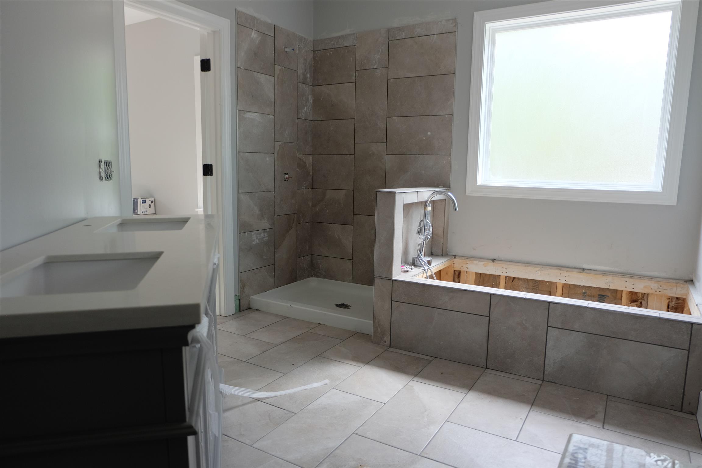 753 Billy Wynn Road Dickson, TN 37055 - Photo 13 of 22 a bathroom with a sink and a bathtub