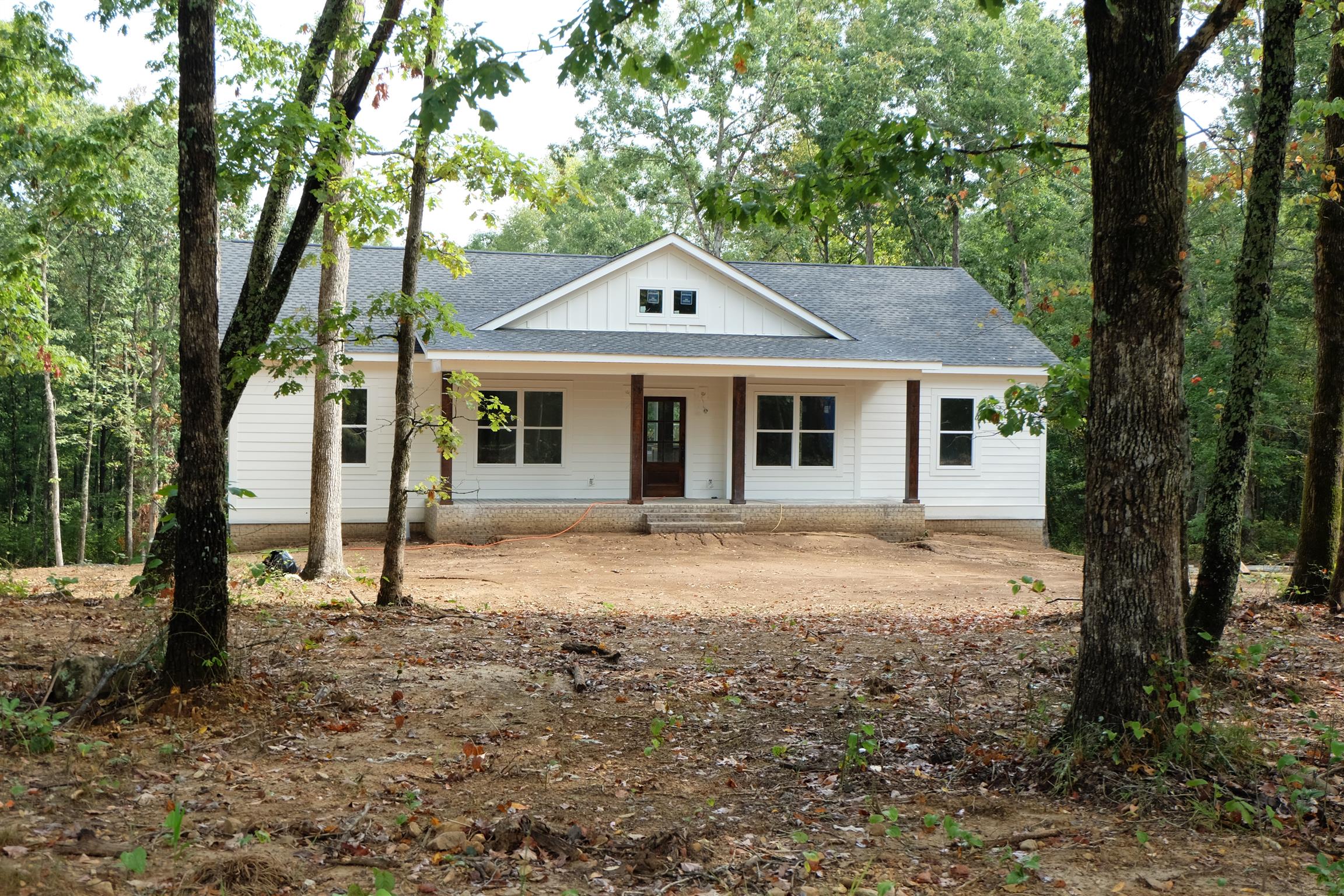 753 Billy Wynn Road Dickson, TN 37055 - Photo 2 of 22 a house with trees in the background