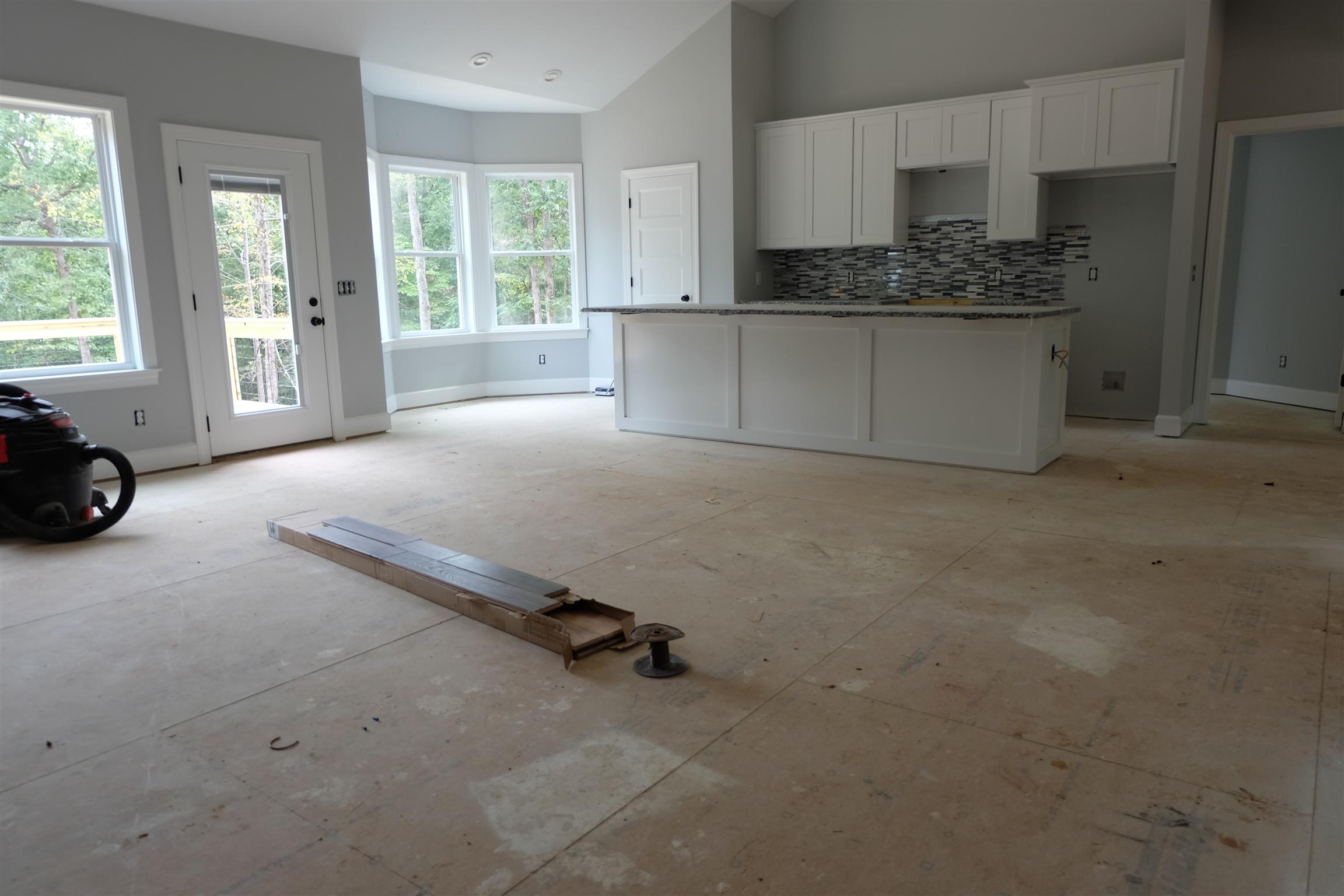 753 Billy Wynn Road Dickson, TN 37055 - Photo 9 of 22 a living room with a couch and a stove next to a window
