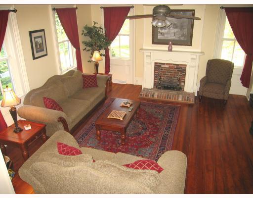 171 Pogue Road West Alexander, PA 15376 - Photo 3 of 8 Living Room. The refinished hardwood floors, charming gas fireplace, gorgeous moulding and original details make this a great gathering space.