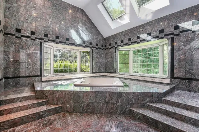 a view of entryway with a front door