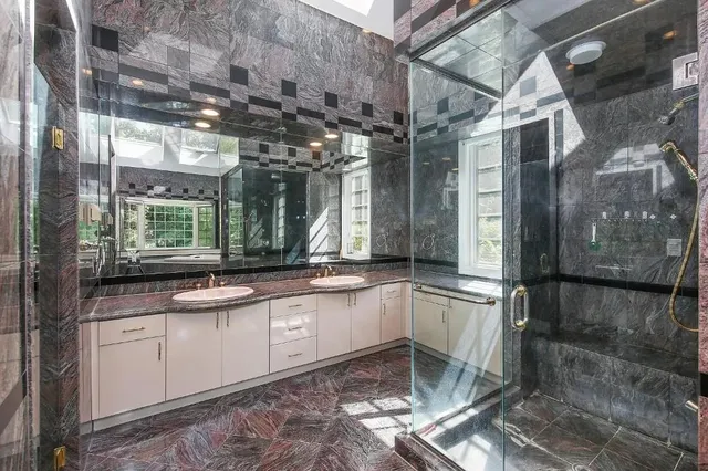 a kitchen with a sink and cabinets