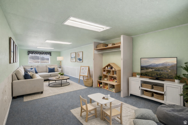 25615 Main Street Portage, UT 84331 - Photo 5 of 42 Living room featuring carpet and a textured ceiling