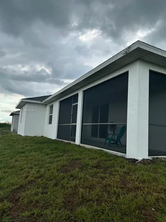 a house with yard in front of it