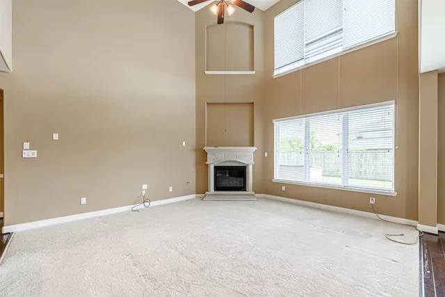 a kitchen with granite countertop a sink and a stove