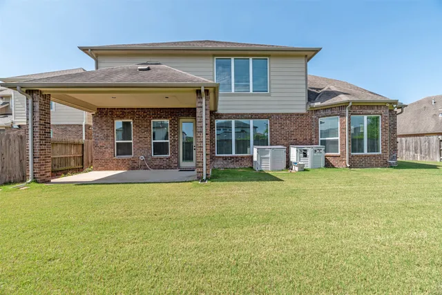 a view of a hallway with windows