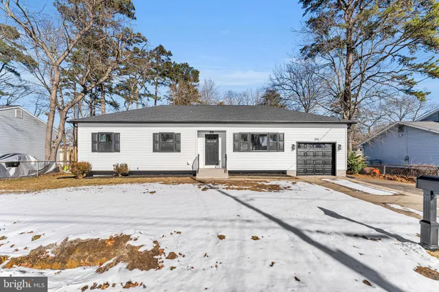 front view of a house with a patio
