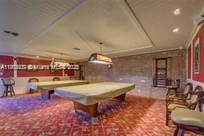 a group of people sitting at tables in a room