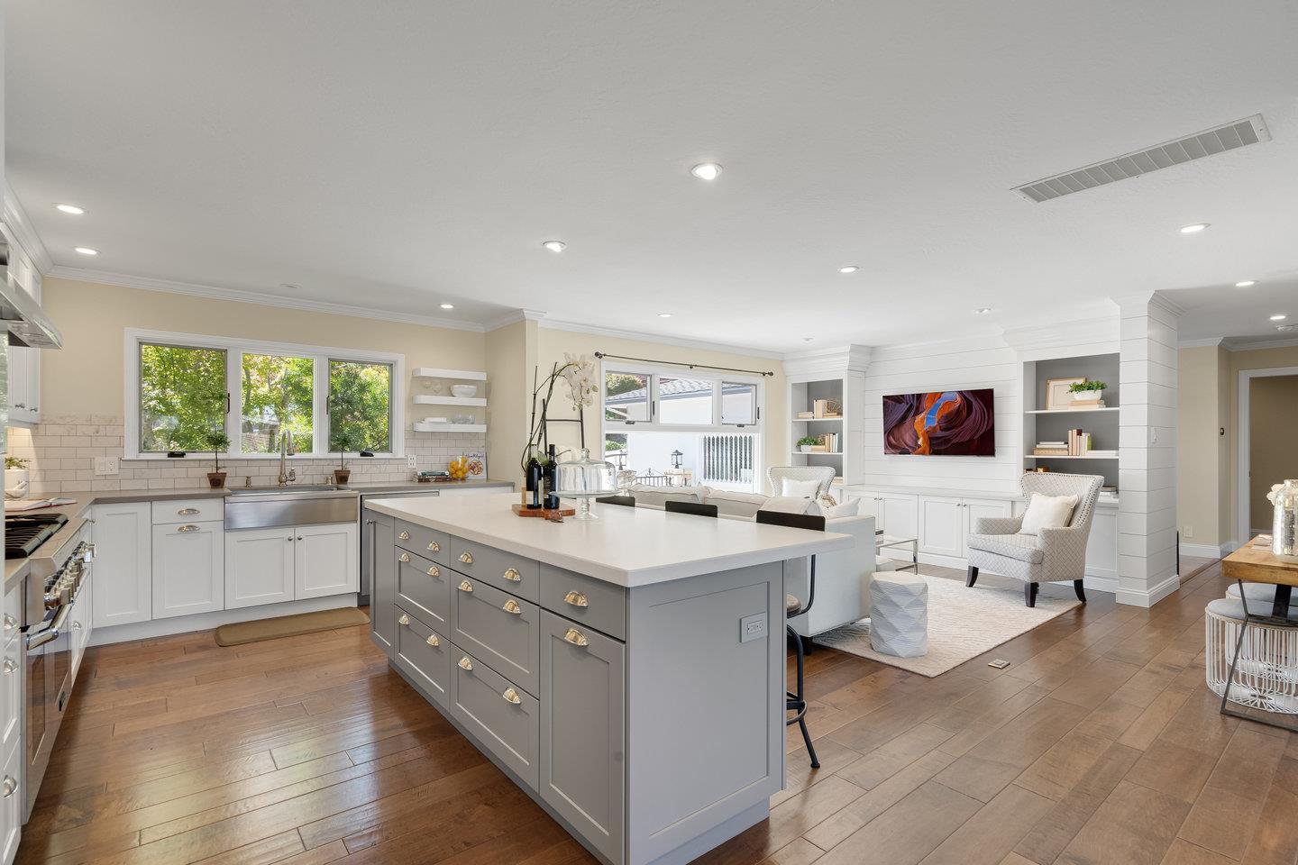 1270 Roble Road Millbrae, CA 94030 - Photo 14 of 35 a open kitchen with sink cabinets and wooden floor