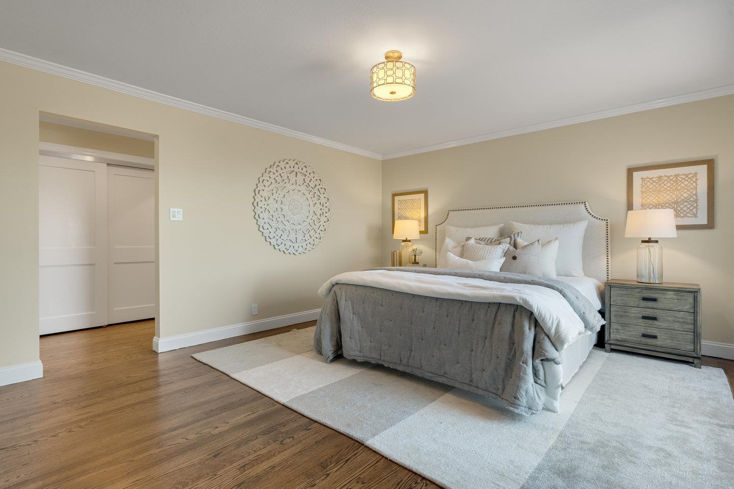 1270 Roble Road Millbrae, CA 94030 - Photo 19 of 35 a spacious bedroom with a bed and a window
