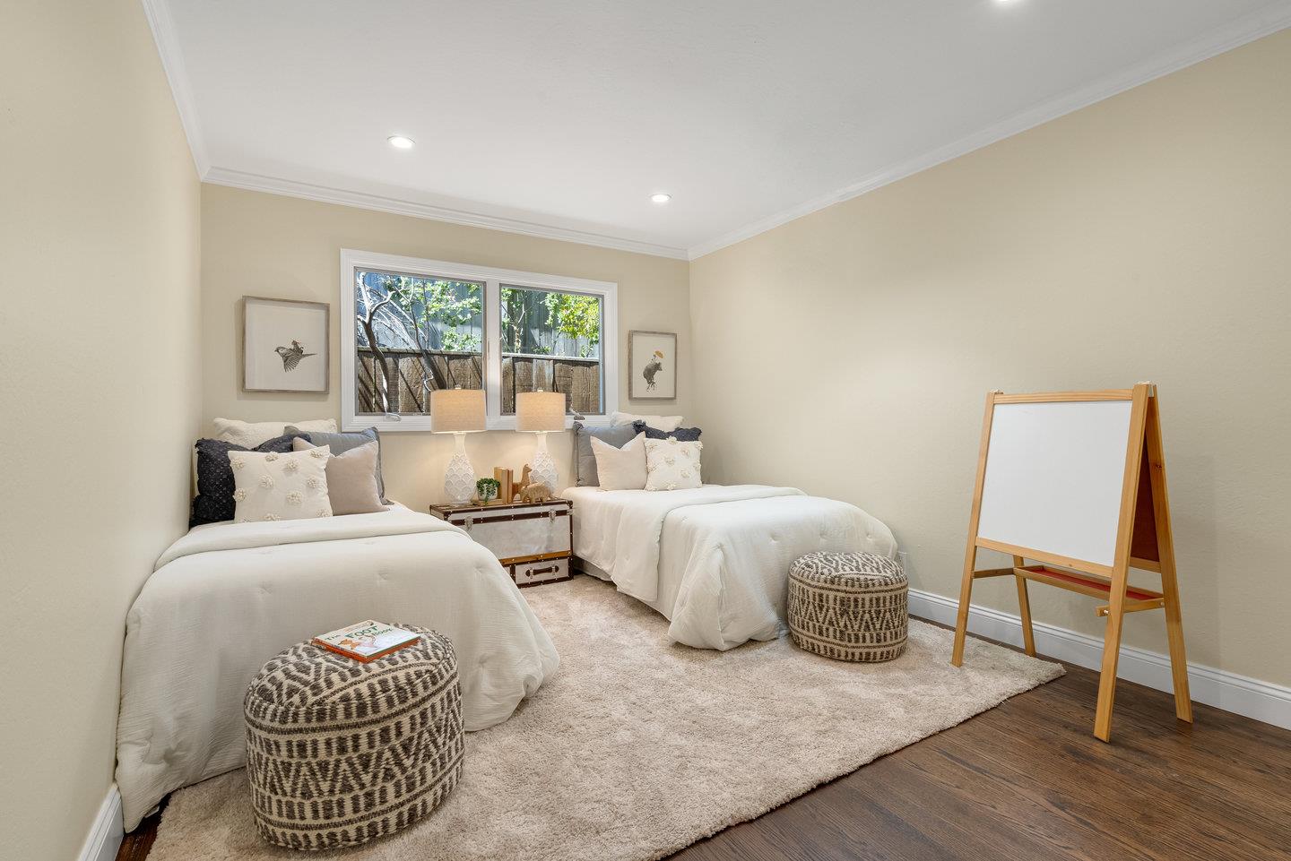 1270 Roble Road Millbrae, CA 94030 - Photo 27 of 35 a spacious bedroom with two beds and a chair