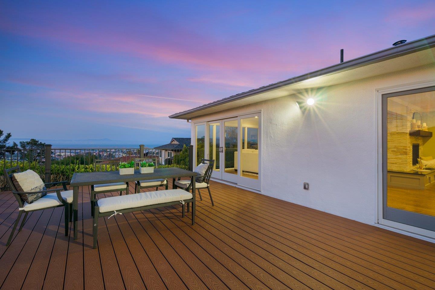 1270 Roble Road Millbrae, CA 94030 - Photo 35 of 35 a balcony with wooden floor table and chairs