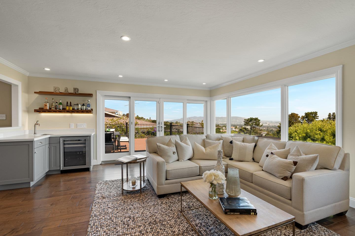 1270 Roble Road Millbrae, CA 94030 - Photo 5 of 35 a living room with furniture and a fireplace