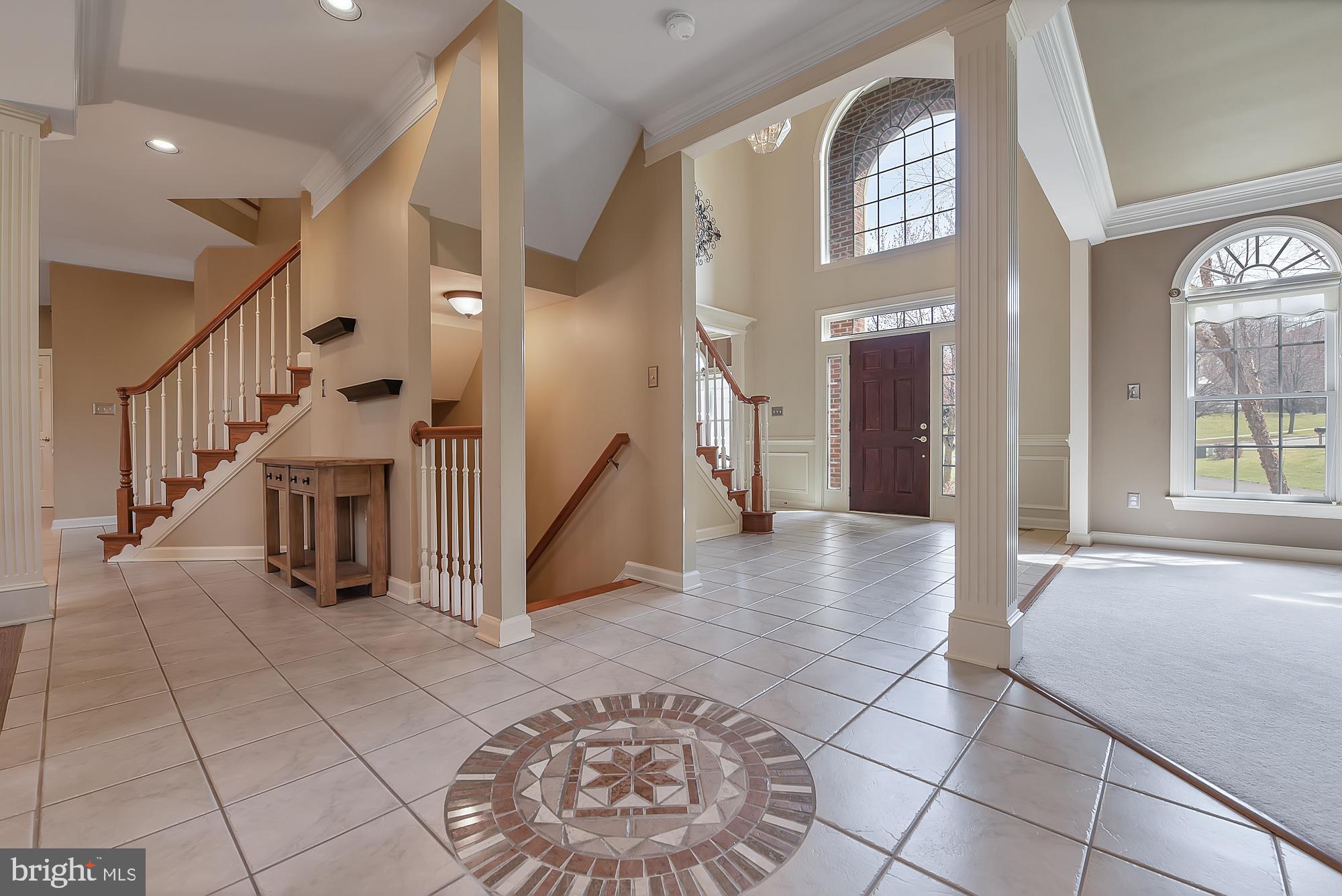 22 Hackett Court Poolesville, MD 20837 - Photo 11 of 54 Custom tile in grand foyer