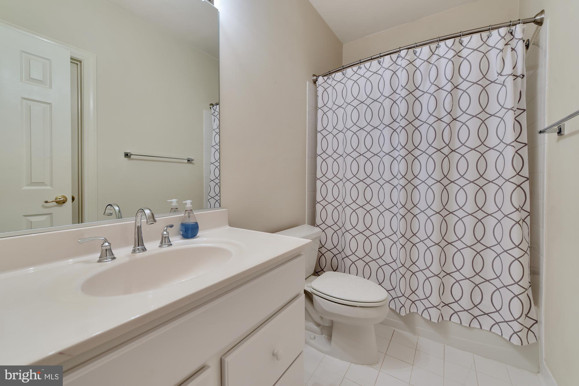 22 Hackett Court Poolesville, MD 20837 - Photo 47 of 54 Full bath serving rec room and 5th bedroom
