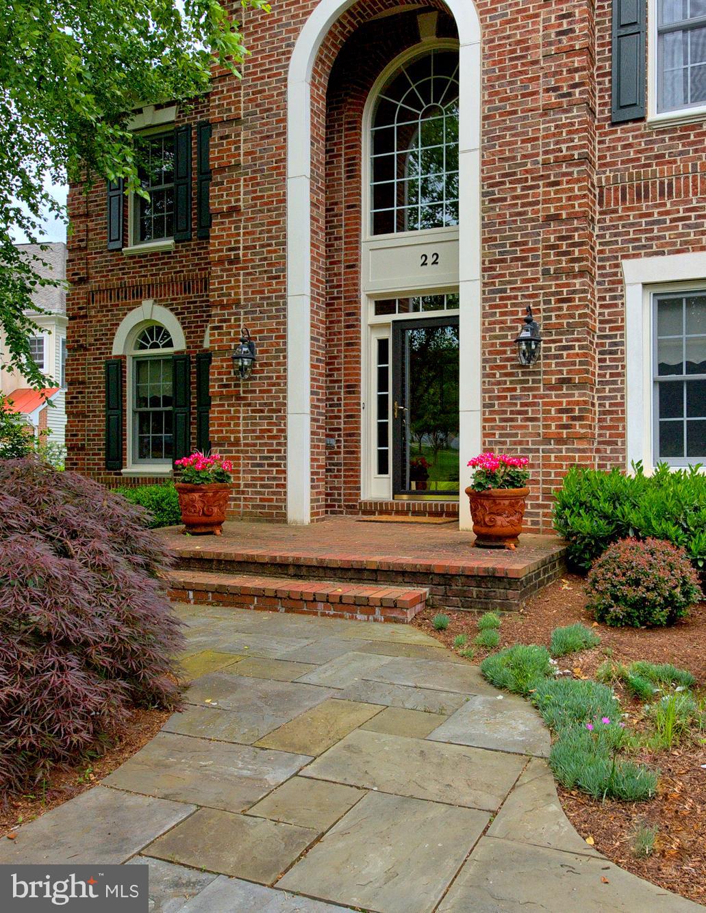 Stone-walkway and covered porch entrance