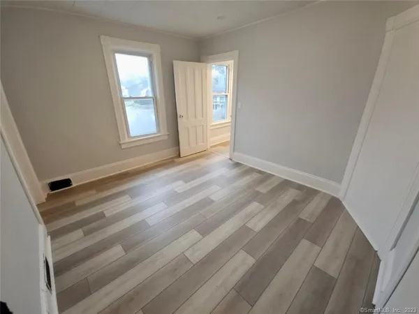 a view of an empty room and window