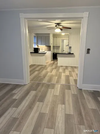 a view of a living room with a rug