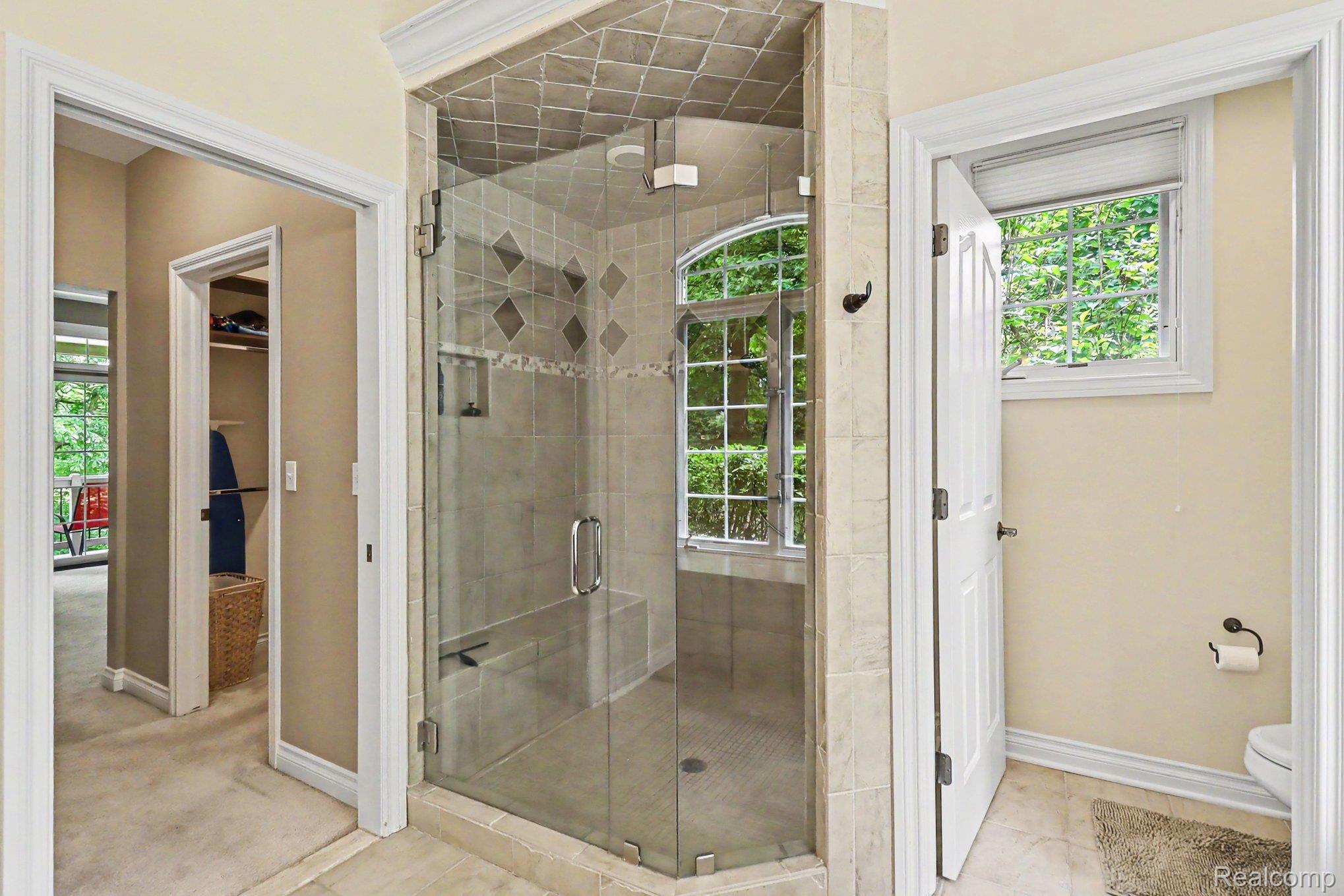 10490 Deer Ridge Trail Holly, MI 48442 - Photo 27 of 56 First floor master bathroom with Glass and tile Shower and separate toilet room