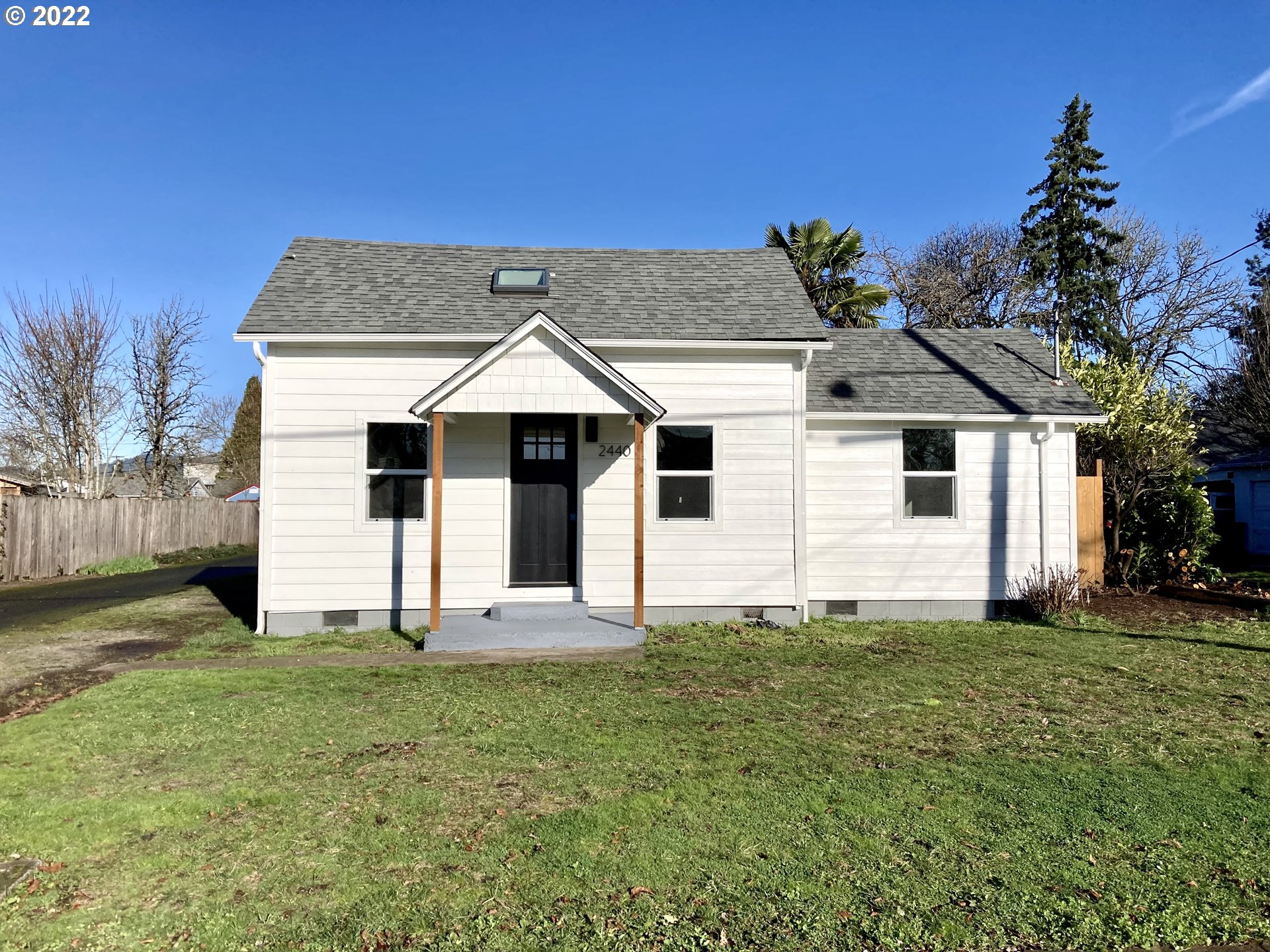 2440 G Street Springfield, OR 97477 - Photo 1 of 25 a front view of a house with a yard