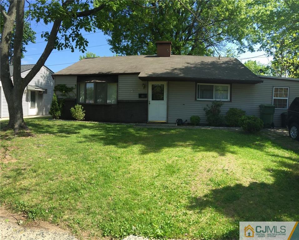31 Colton Road Edison, NJ 08817 - Photo 1 of 10 a front view of a house with a garden