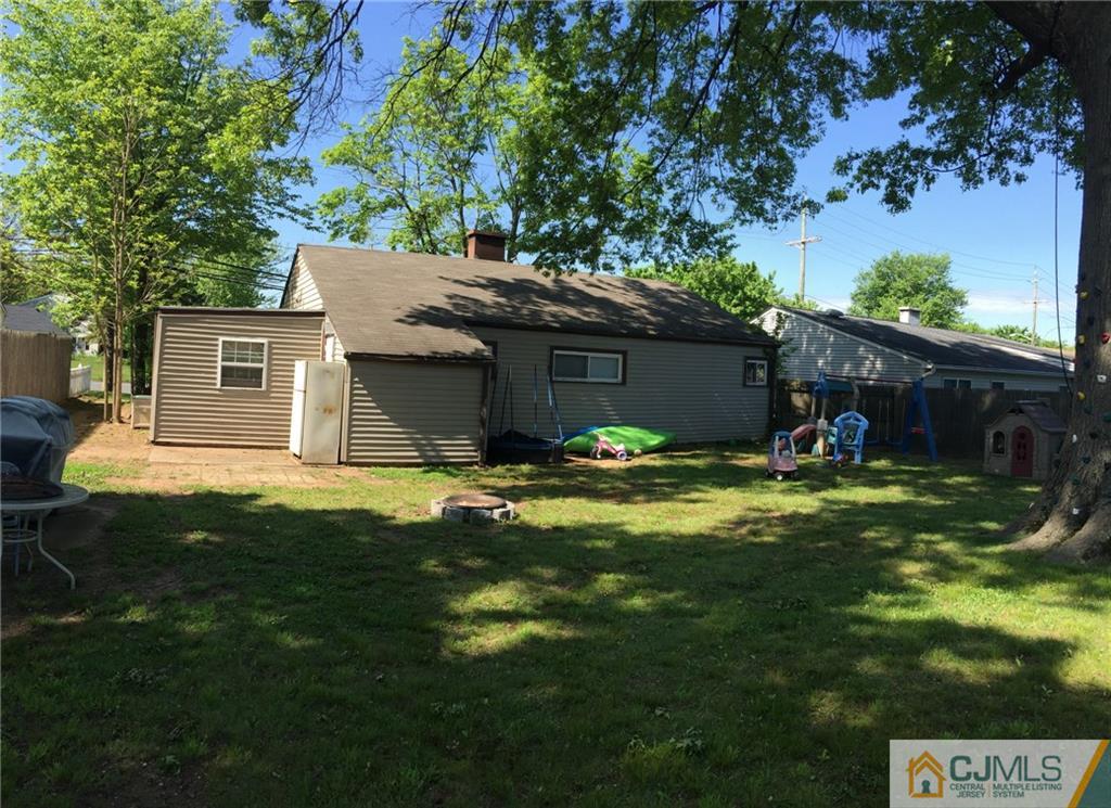 31 Colton Road Edison, NJ 08817 - Photo 6 of 10 a view of a house with a yard