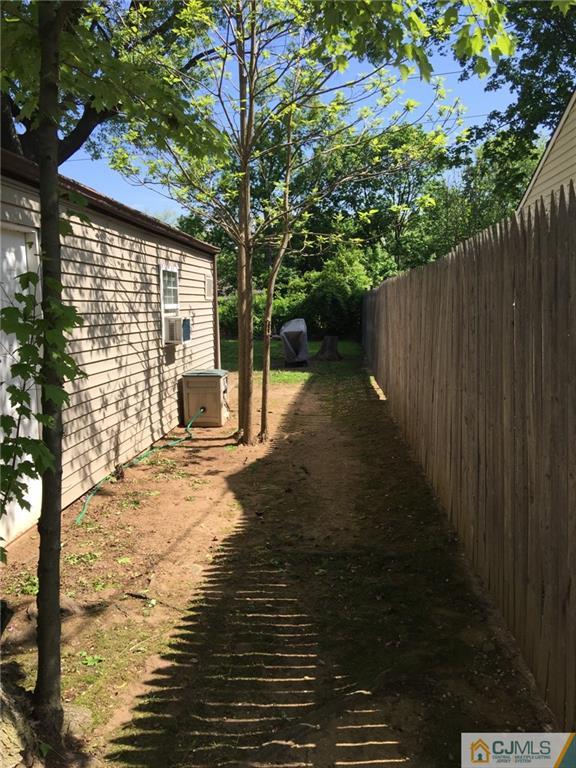 31 Colton Road Edison, NJ 08817 - Photo 10 of 10 a backyard of a house with lots of green space