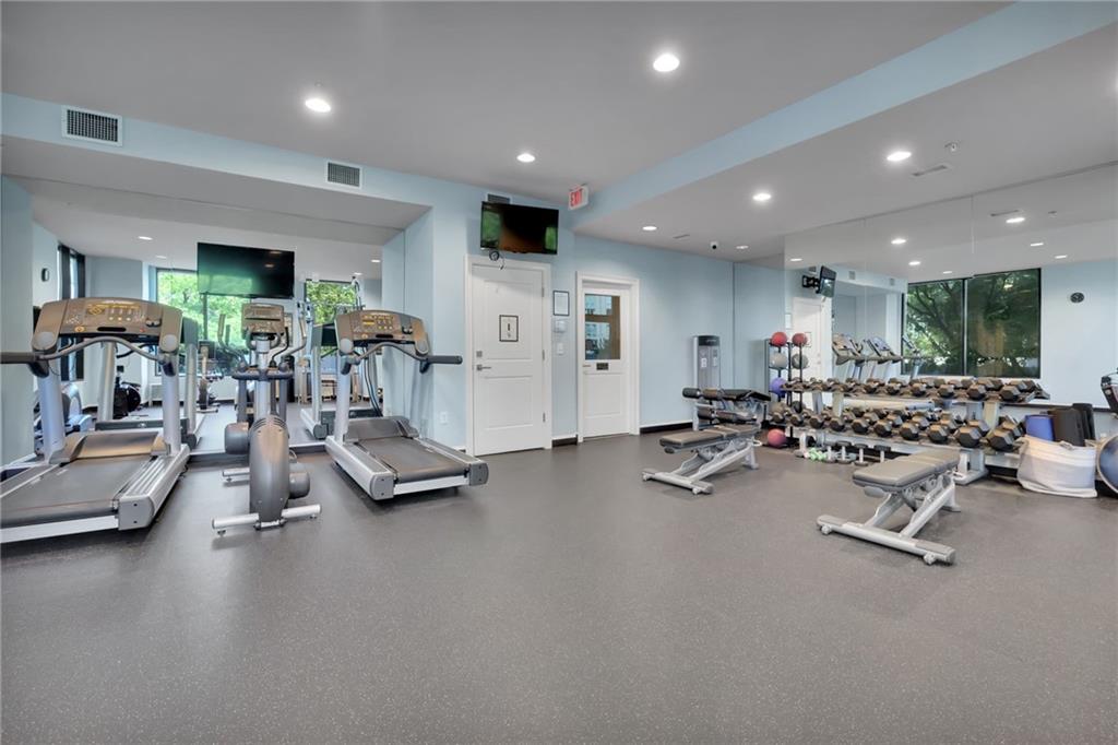 2828 Peachtree Road Northwest, Unit 1901 Atlanta, GA 30305 - Photo 31 of 35 a view of a room with gym equipment