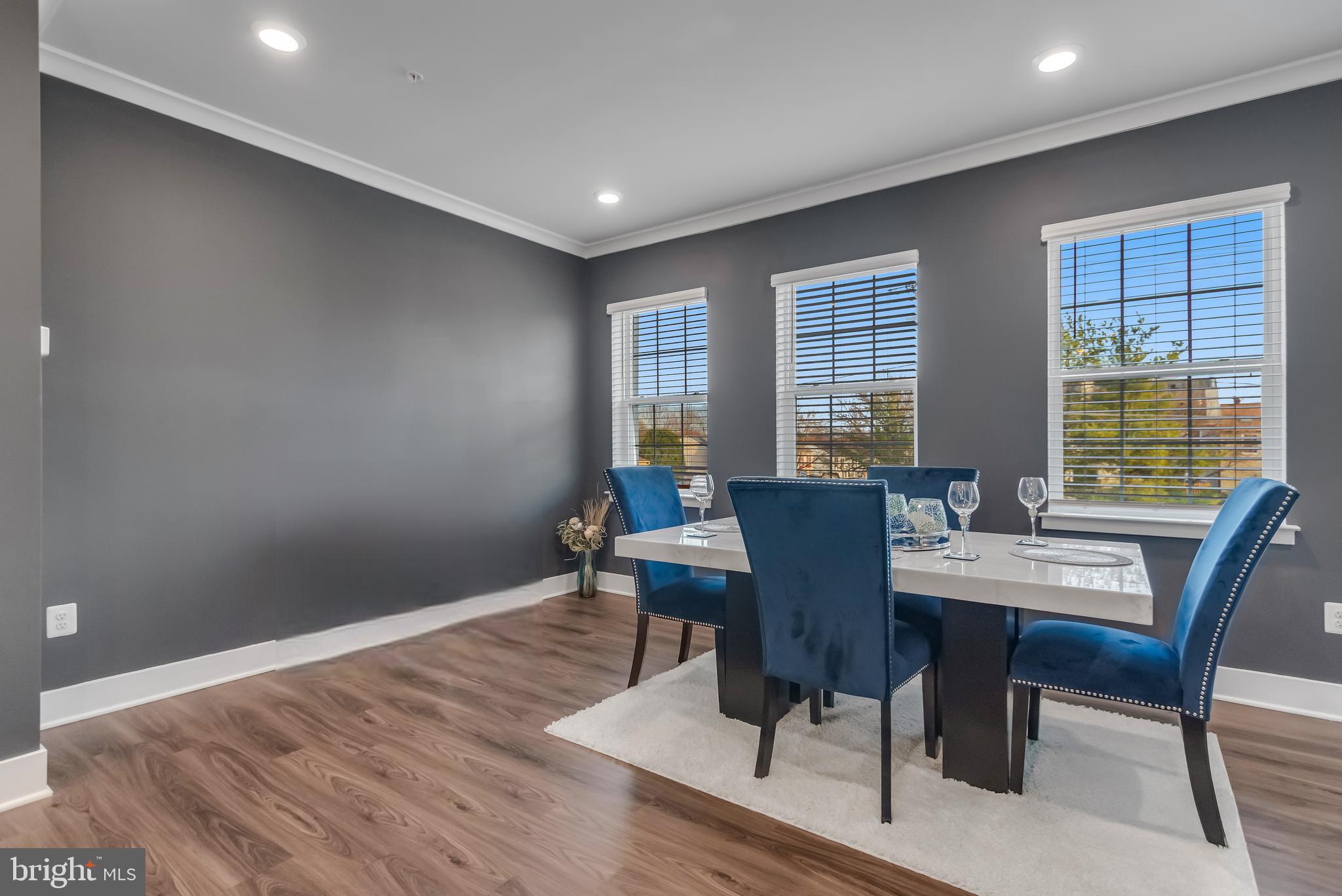 7806 Johnnycake Road Windsor Mill, MD 21244 - Photo 15 of 28 a view of a dining room with furniture window and outside view