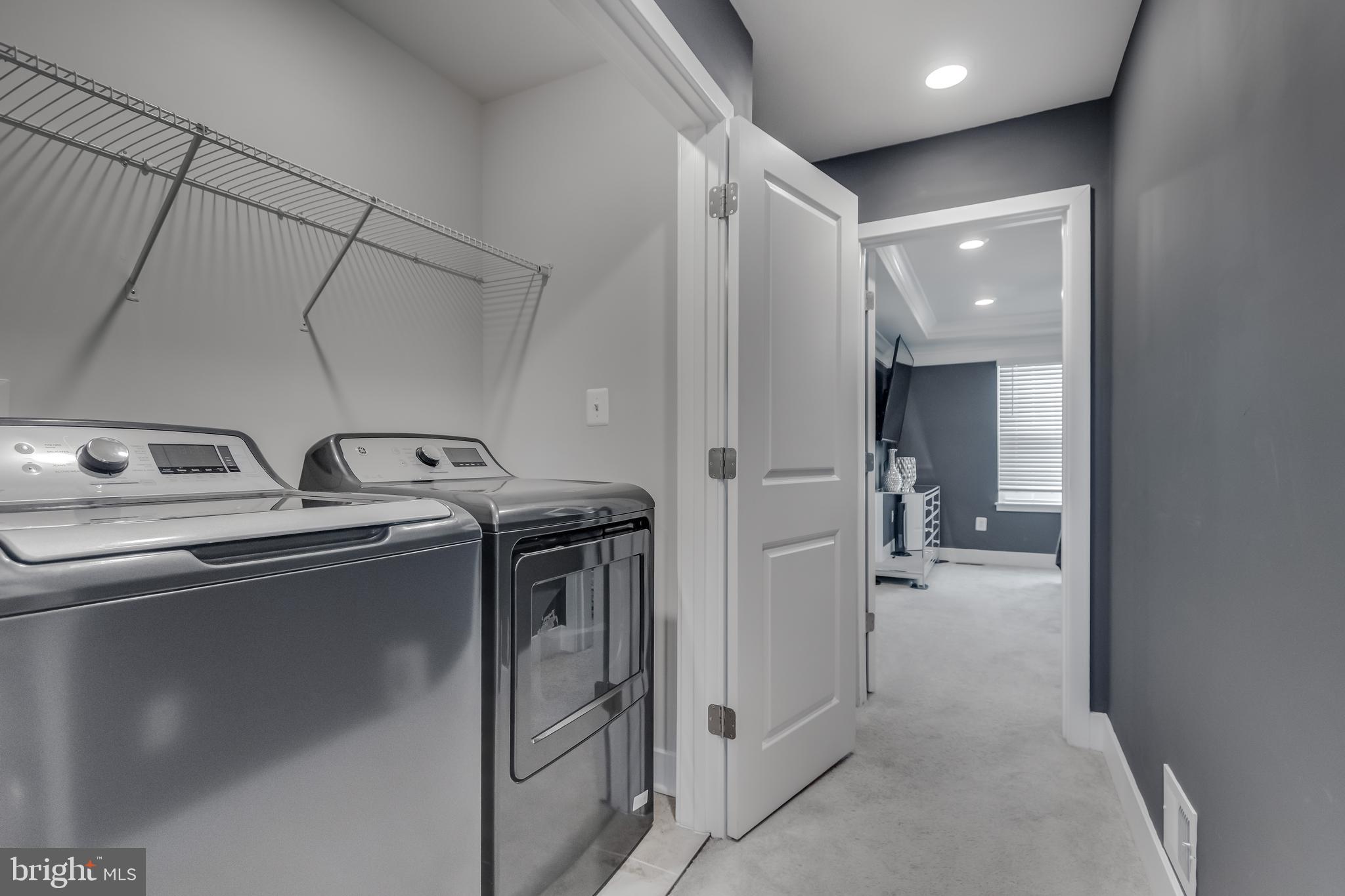 7806 Johnnycake Road Windsor Mill, MD 21244 - Photo 28 of 28 a utility room with dryer and washer