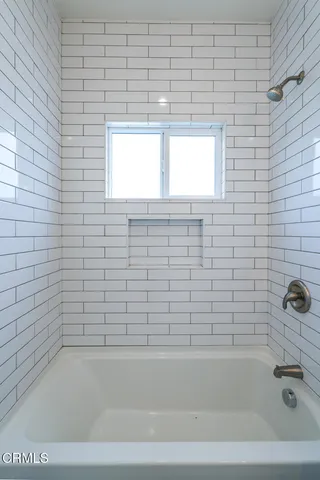 a bathroom with a bathtub