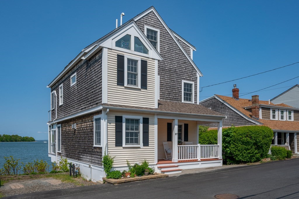 87 Bay Street Hull, MA 02045 - Photo 2 of 25 a front view of a house with a yard