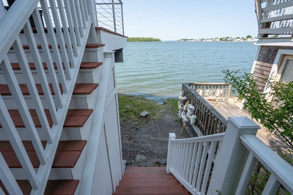 87 Bay Street Hull, MA 02045 - Photo 23 of 25 a view of balcony with wooden floor and stairs